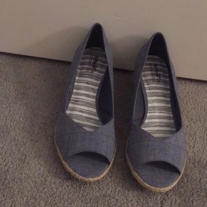 Blue wedge heels.